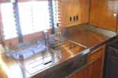 Picture of beautiful stainless steel counter top in 1948 Westcraft Sequoia Trailer
